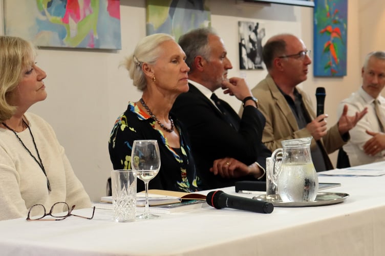 Gideon Amos MP hosts public meeting to share results of dental survey. Left: Cllr Sarah Wakefield, Dr Lucy Pendered. Right:  Jonathan Mynors-Wallis and Gideon Amos MP